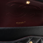 CHANEL Handbag Black Caviar Quilted Jumbo Classic Flap Gold Hardware - Redeluxe