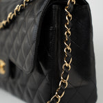 CHANEL Handbag Black Caviar Quilted Jumbo Classic Flap Gold Hardware - Redeluxe