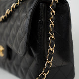 CHANEL Handbag Black Caviar Quilted Jumbo Classic Flap Gold Hardware - Redeluxe