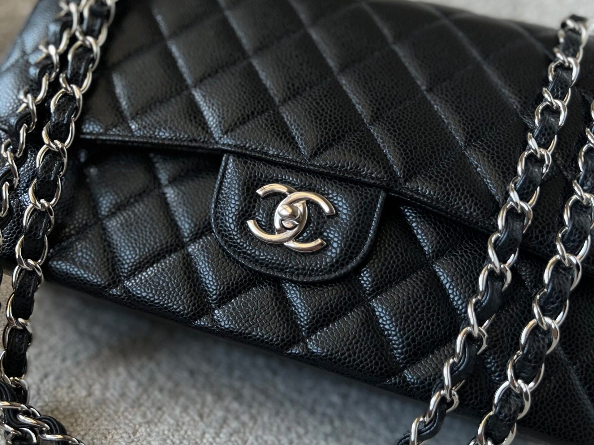 CHANEL Handbag Black Caviar Quilted Jumbo Classic Flap Silver Hardware - Redeluxe