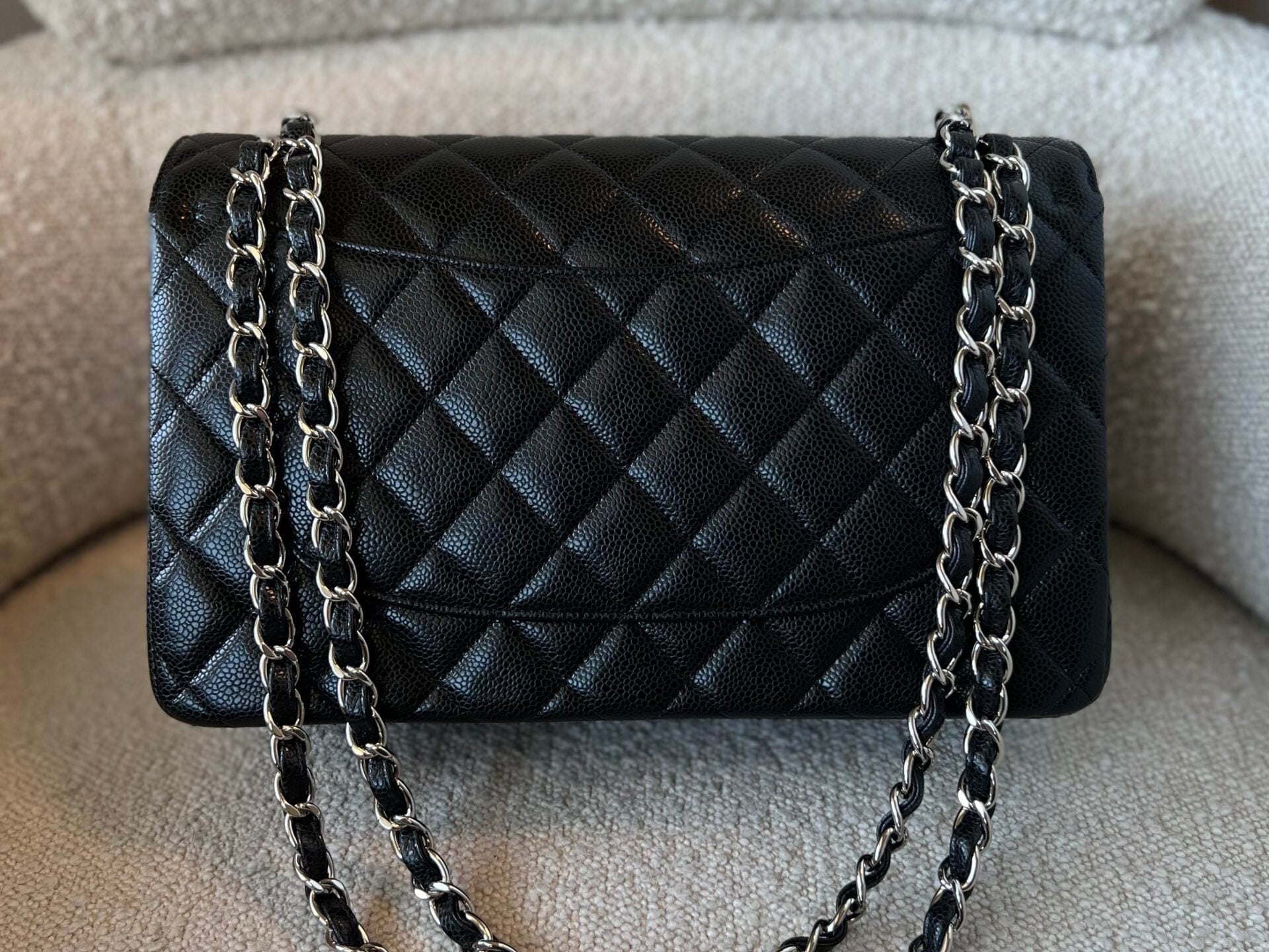 CHANEL Handbag Black Caviar Quilted Jumbo Classic Flap Silver Hardware - Redeluxe
