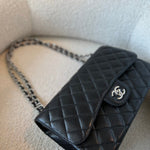 CHANEL Handbag Black Caviar Quilted Jumbo Classic Flap Silver Hardware - Redeluxe