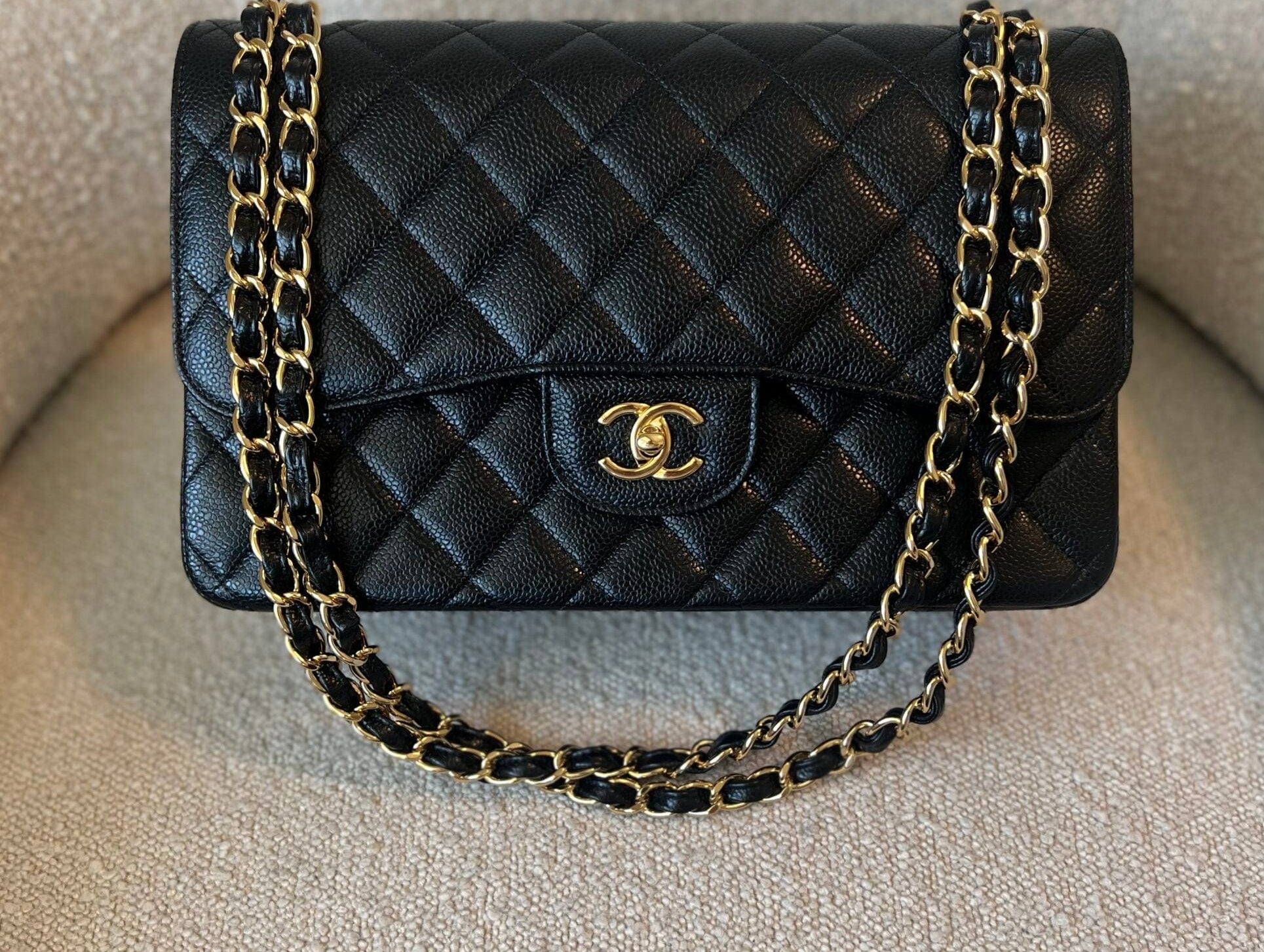 Buy CHANEL Black Caviar Quilted Jumbo Classic Flap LGHW Luxury