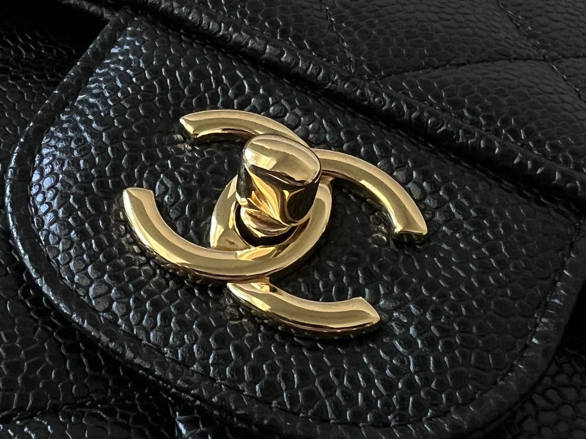 CHANEL Handbag Black Chanel Black Caviar Quilted Jumbo Classic Flap GHW - Redeluxe