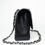 CHANEL Handbag Black Jumbo Caviar Quilted Classic Flap Silver Hardware - Redeluxe