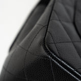 CHANEL Handbag Black Jumbo Caviar Quilted Classic Flap Silver Hardware - Redeluxe