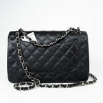 CHANEL Handbag Black Jumbo Caviar Quilted Classic Flap Silver Hardware - Redeluxe