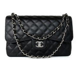 CHANEL Handbag Black Jumbo Caviar Quilted Classic Flap Silver Hardware - Redeluxe