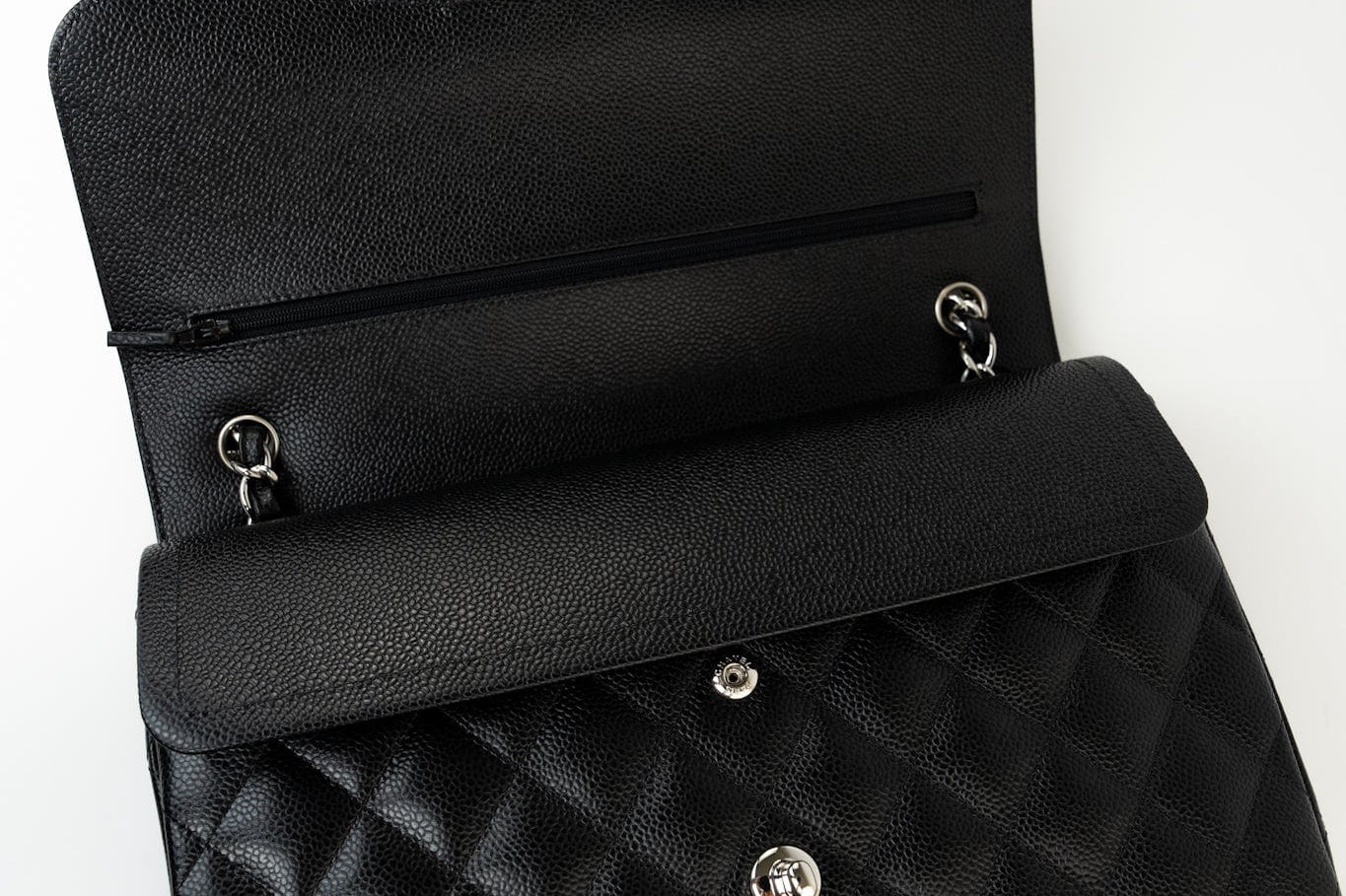 CHANEL Handbag Black Jumbo Caviar Quilted Classic Flap Silver Hardware - Redeluxe