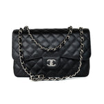 CHANEL Handbag Black Jumbo Caviar Quilted Classic Flap Silver Hardware - Redeluxe