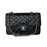 CHANEL Handbag Black Jumbo Caviar Quilted Classic Flap Silver Hardware - Redeluxe