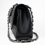 CHANEL Handbag Black Jumbo Caviar Quilted Classic Flap Silver Hardware - Redeluxe