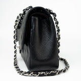 CHANEL Handbag Black Jumbo Caviar Quilted Classic Flap Silver Hardware - Redeluxe