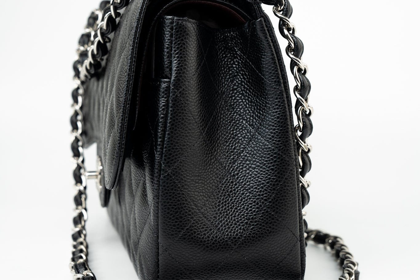 CHANEL Handbag Black Jumbo Caviar Quilted Classic Flap Silver Hardware - Redeluxe