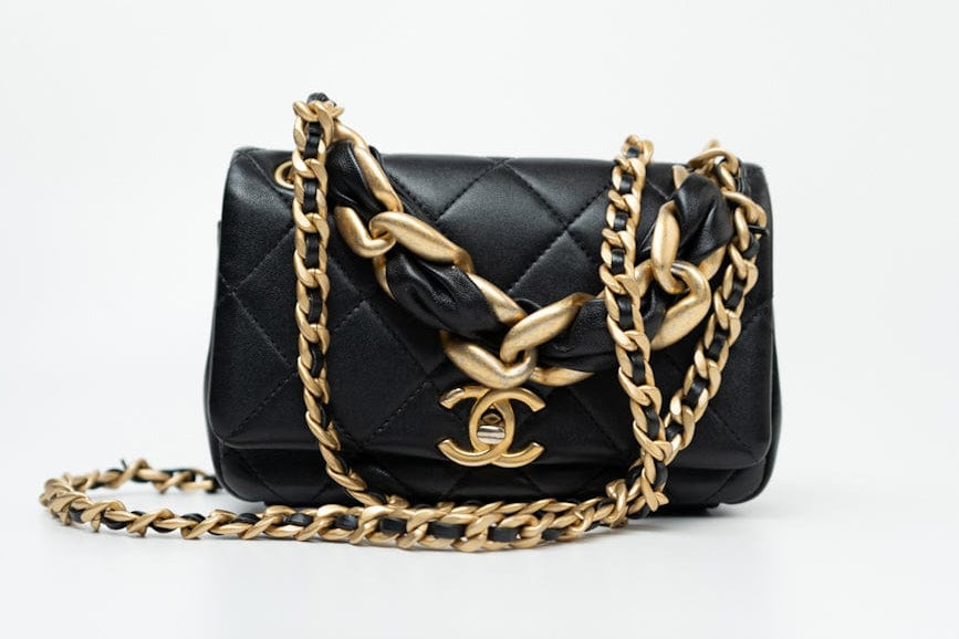 CHANEL Handbag Black Lambskin Quilted Entwined Single Flap Mini Aged Hardware - Redeluxe