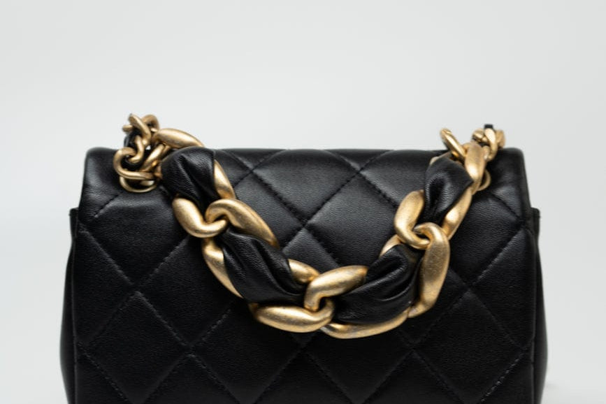CHANEL Handbag Black Lambskin Quilted Entwined Single Flap Mini Aged Hardware - Redeluxe