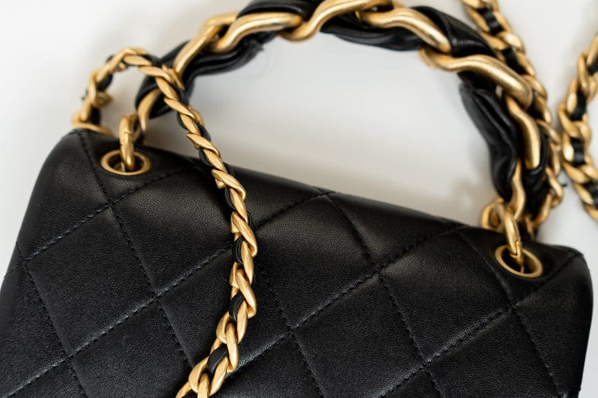 CHANEL Handbag Black Lambskin Quilted Entwined Single Flap Mini Aged Hardware - Redeluxe