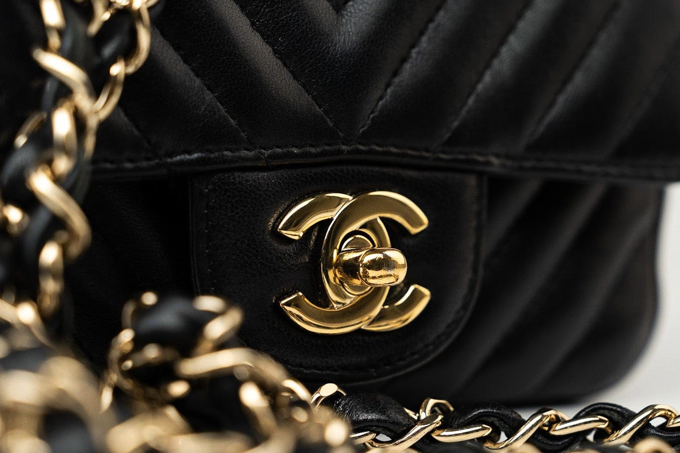 CHANEL Handbag Black Mini Square Black Lambskin Chevron Flap LGHW - Redeluxe