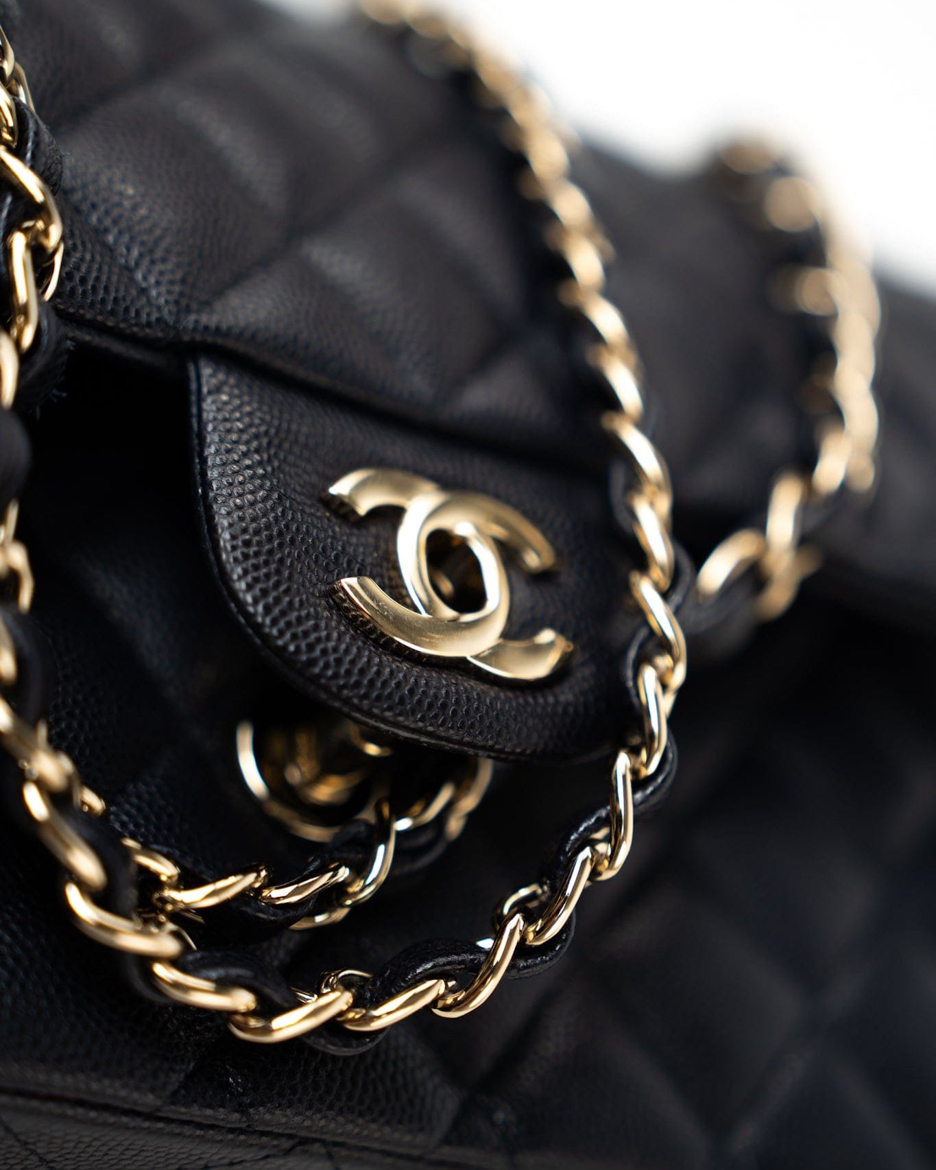 CHANEL Handbag Black Navy Caviar Quilted Classic Flap Medium Light Gold Hardware - Redeluxe