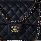 CHANEL Handbag Black Navy Caviar Quilted Classic Flap Medium Light Gold Hardware - Redeluxe