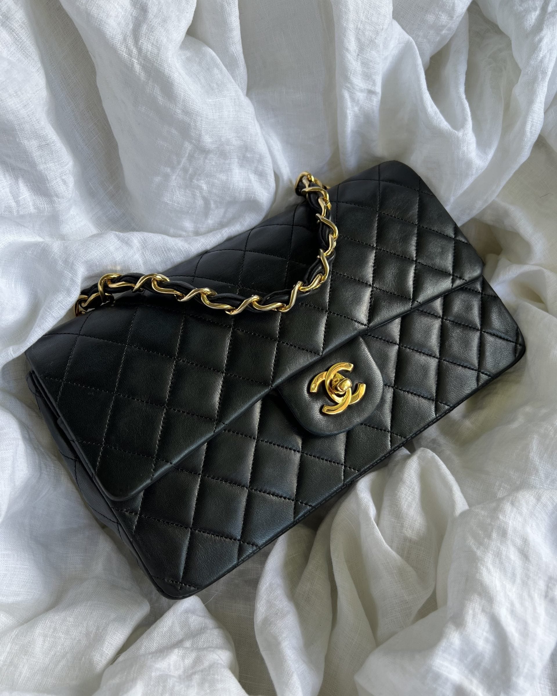 CHANEL Handbag Black Vintage Lambskin Quilted Classic Flap with Handle Medium GHW - Redeluxe