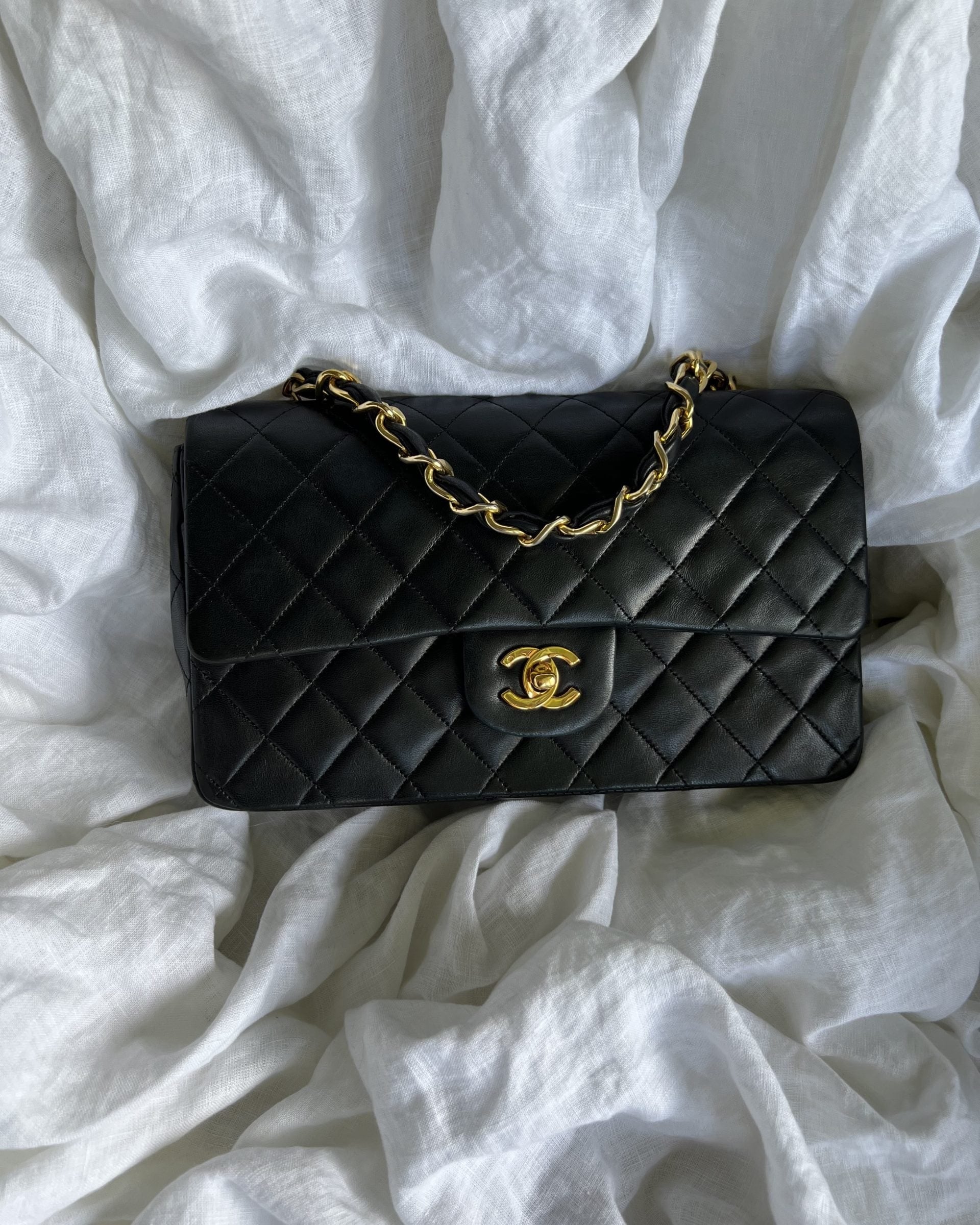 CHANEL Handbag Black Vintage Lambskin Quilted Classic Flap with Handle Medium GHW - Redeluxe