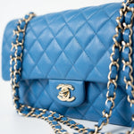 CHANEL Handbag Blue 20S Blue Caviar Quilted Classic Flap Medium Light Gold Hardware - Redeluxe