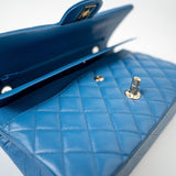 CHANEL Handbag Blue 20S Blue Caviar Quilted Classic Flap Medium Light Gold Hardware - Redeluxe
