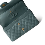 CHANEL Handbag Blue / Classic flap Pearly Light Blue Caviar Quilted Classic Flap Medium Antique Gold Hardware - Redeluxe