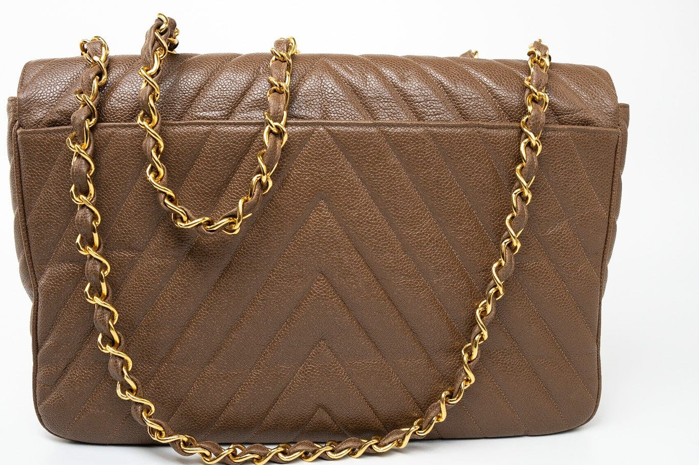 CHANEL Handbag Brown Taupe Caviar Chevron Maxi Single Flap 24K Gold Hardware - Redeluxe
