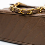CHANEL Handbag Brown Taupe Caviar Chevron Maxi Single Flap 24K Gold Hardware - Redeluxe