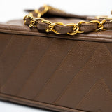 CHANEL Handbag Brown Taupe Caviar Chevron Maxi Single Flap 24K Gold Hardware - Redeluxe
