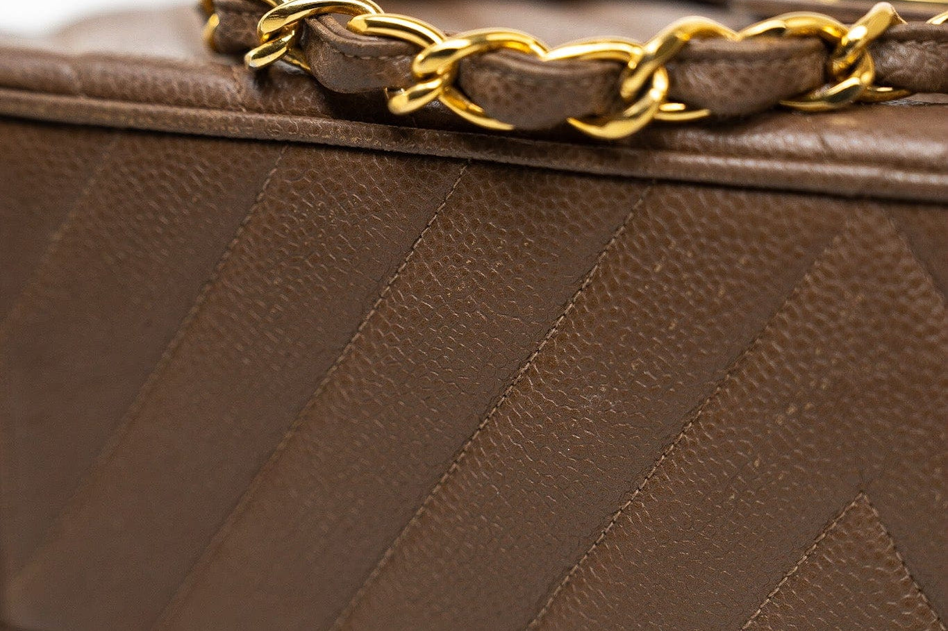 CHANEL Handbag Brown Taupe Caviar Chevron Maxi Single Flap 24K Gold Hardware - Redeluxe