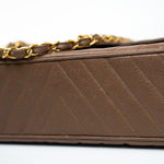 CHANEL Handbag Brown Taupe Caviar Chevron Maxi Single Flap 24K Gold Hardware - Redeluxe