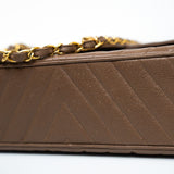 CHANEL Handbag Brown Taupe Caviar Chevron Maxi Single Flap 24K Gold Hardware - Redeluxe