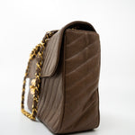 CHANEL Handbag Brown Taupe Caviar Chevron Maxi Single Flap 24K Gold Hardware - Redeluxe