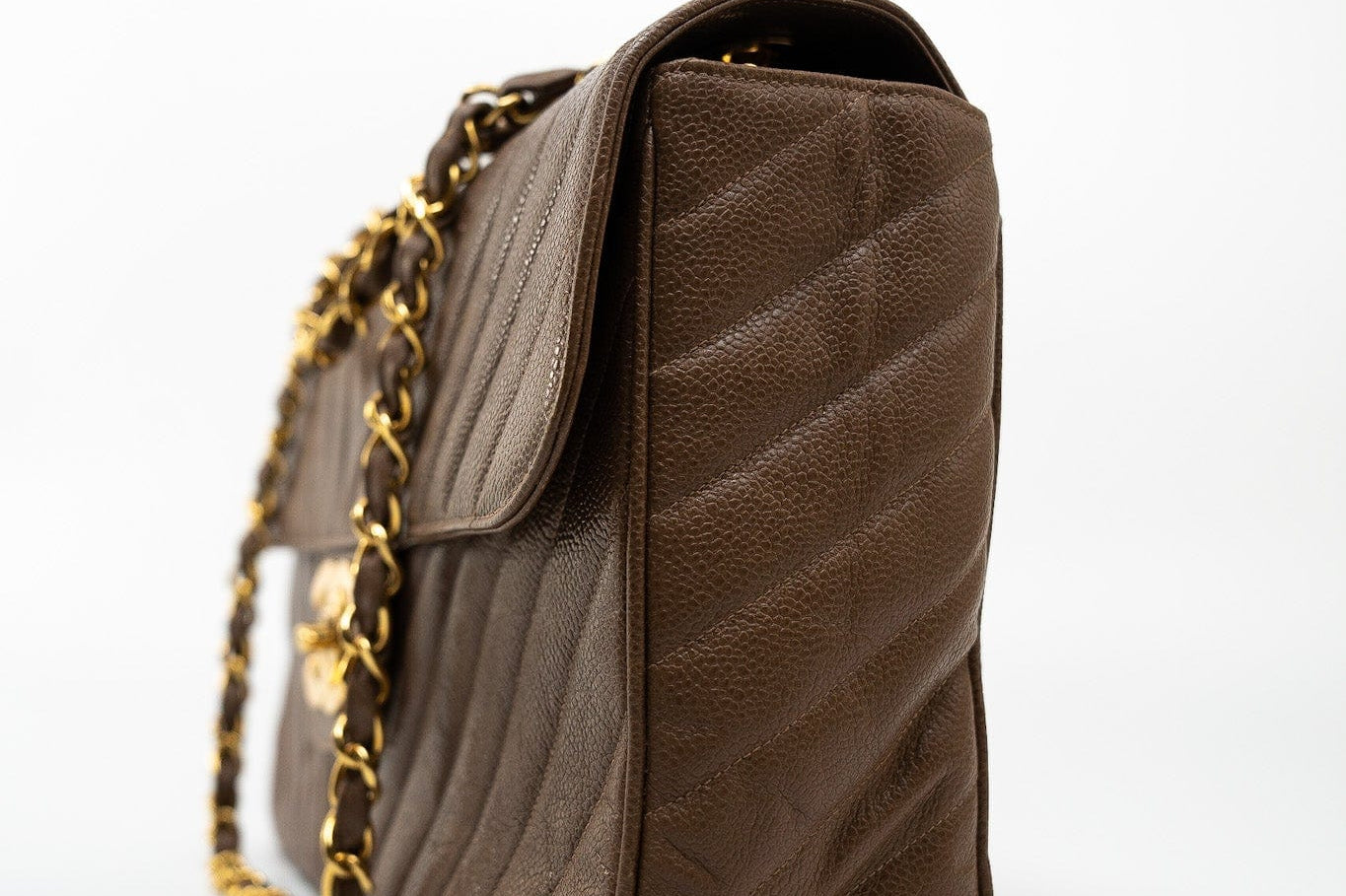 CHANEL Handbag Brown Taupe Caviar Chevron Maxi Single Flap 24K Gold Hardware - Redeluxe