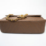 CHANEL Handbag Brown Taupe Caviar Chevron Maxi Single Flap 24K Gold Hardware - Redeluxe