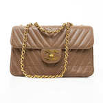 CHANEL Handbag Brown Taupe Caviar Chevron Maxi Single Flap 24K Gold Hardware - Redeluxe