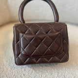 CHANEL Handbag Brown Vintage Brown Lambskin Quilted Micro Mini Kelly with Top Handle GHW - Redeluxe