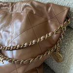 CHANEL Handbag Caramel Shiny Calfskin Quilted 22 Drawstring Bag Small GHW - Redeluxe
