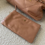 CHANEL Handbag Caramel Shiny Calfskin Quilted 22 Drawstring Bag Small GHW - Redeluxe