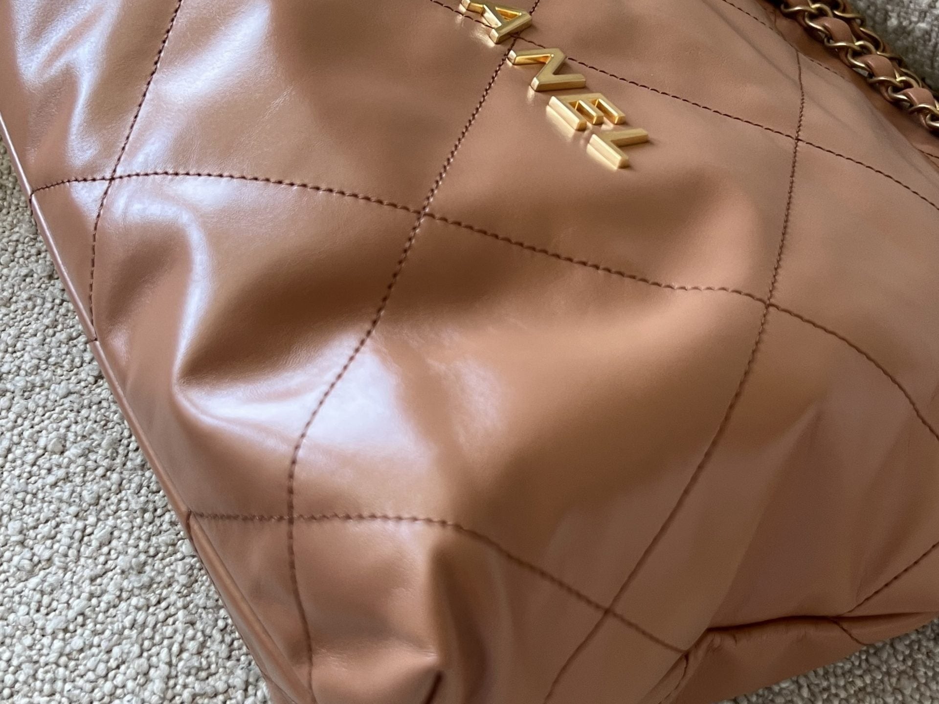 CHANEL Handbag Caramel Shiny Calfskin Quilted 22 Drawstring Bag Small GHW - Redeluxe