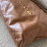 CHANEL Handbag Caramel Shiny Calfskin Quilted 22 Drawstring Bag Small GHW - Redeluxe
