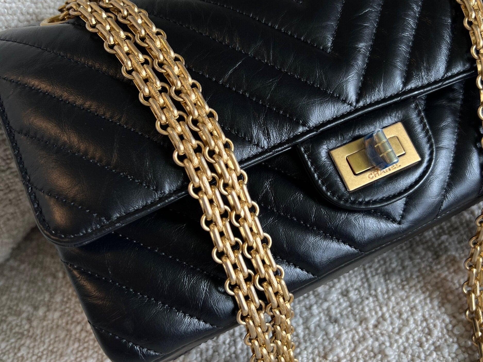 CHANEL Handbag Chanel 21K Reissue 2.55 Black Chevron Aged Calfskin Quilted 225 (Medium) AGHW - Redeluxe