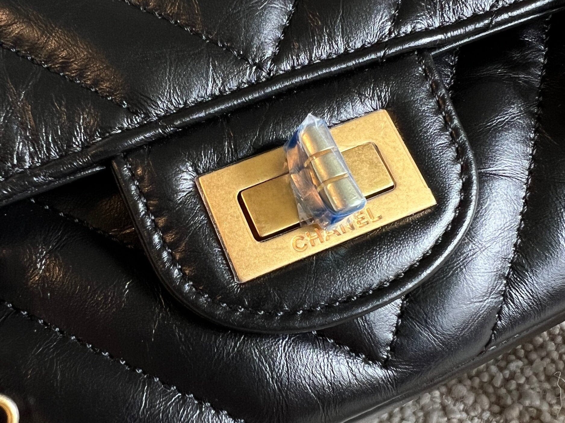 CHANEL Handbag Chanel 21K Reissue 2.55 Black Chevron Aged Calfskin Quilted 225 (Medium) AGHW - Redeluxe