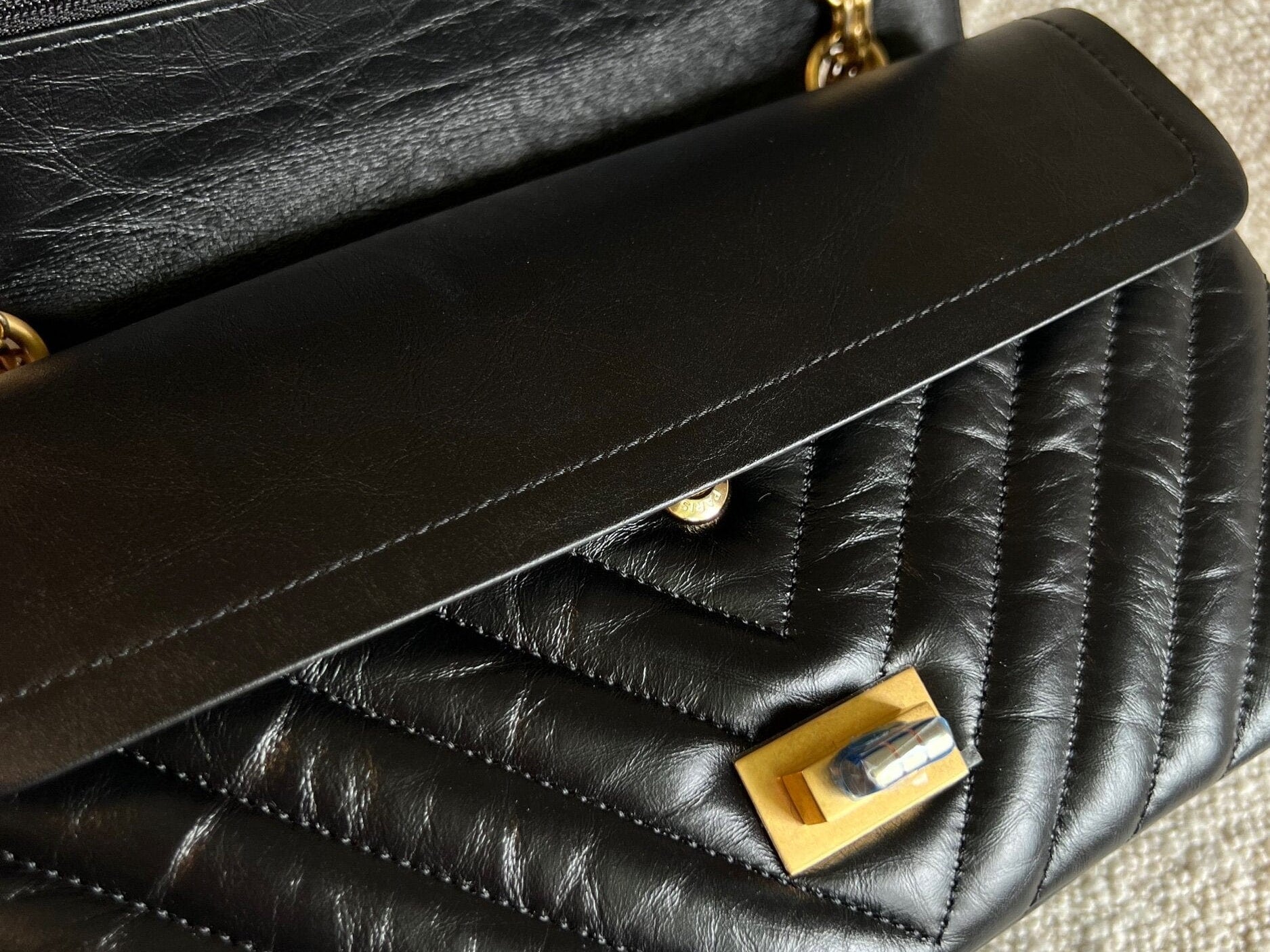 CHANEL Handbag Chanel 21K Reissue 2.55 Black Chevron Aged Calfskin Quilted 225 (Medium) AGHW - Redeluxe