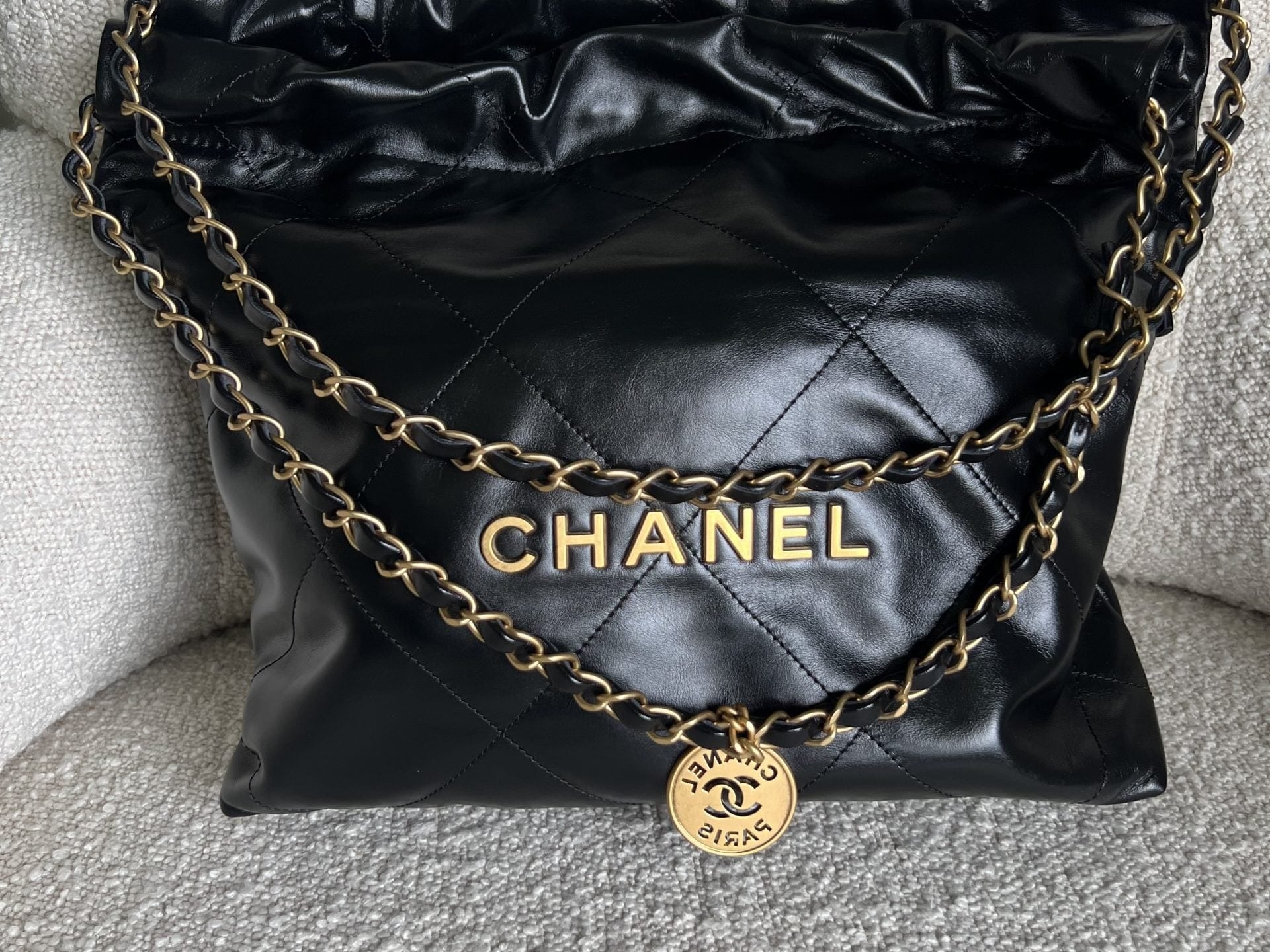 CHANEL Handbag Chanel 22 Shiny Calfskin Quilted Drawstring Bag GHW - Redeluxe