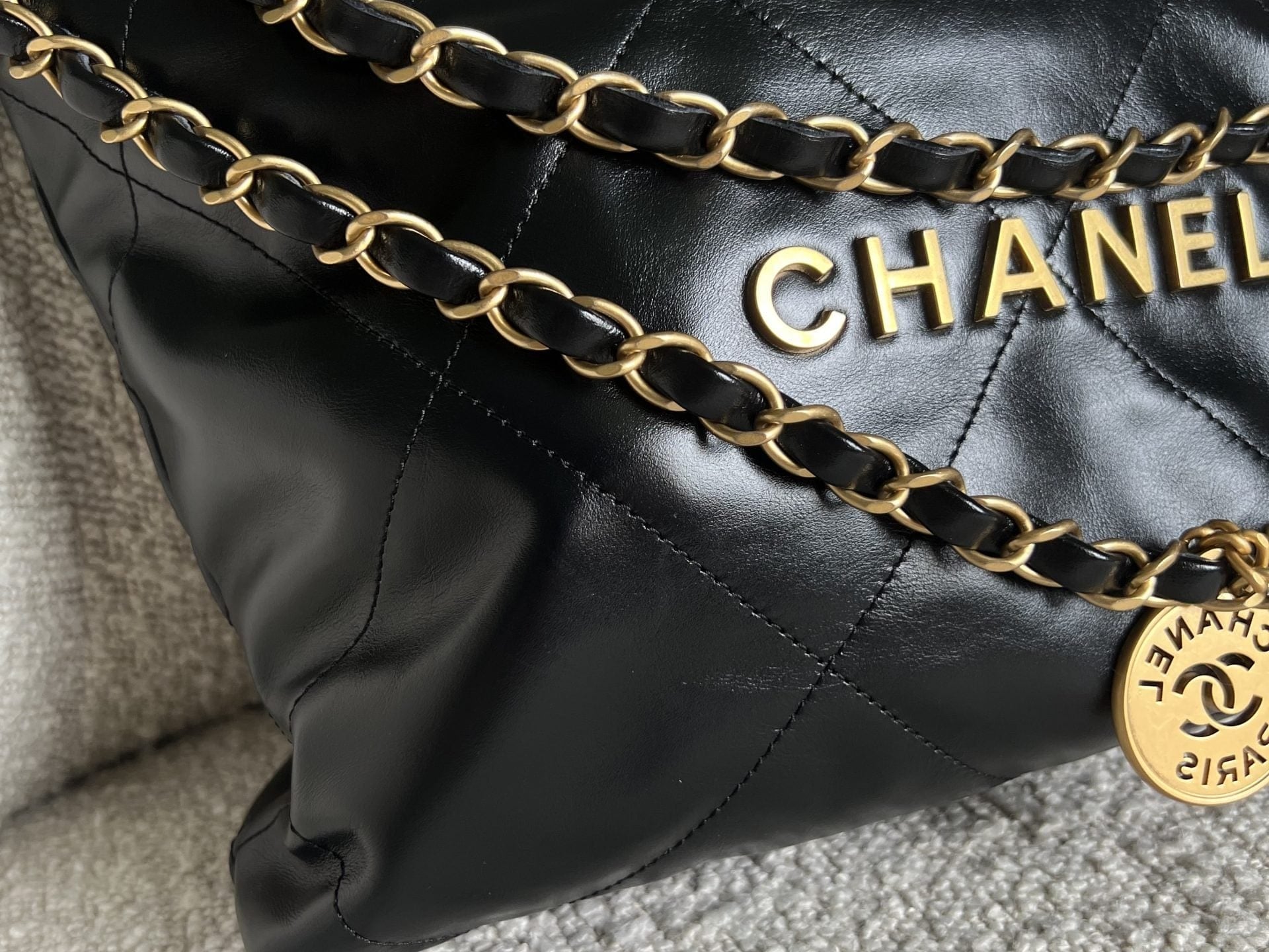 CHANEL Handbag Chanel 22 Shiny Calfskin Quilted Drawstring Bag GHW - Redeluxe