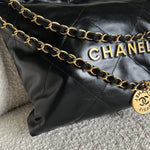 CHANEL Handbag Chanel 22 Shiny Calfskin Quilted Drawstring Bag GHW - Redeluxe